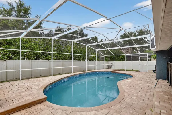 $699,999 | 5232 Hammock Circle, St. Cloud, FL 34771