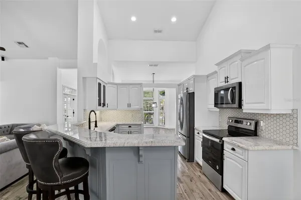 $699,999 | 5232 Hammock Circle, St. Cloud, FL 34771