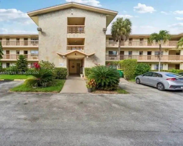 a house view with a garden space