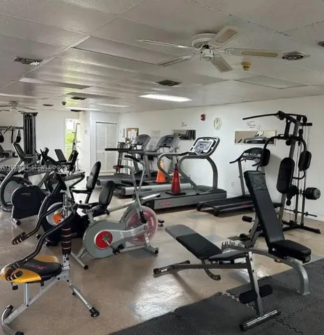 a living room with a window and a table