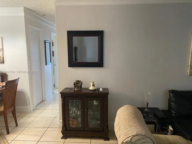 a bathroom with a toilet a sink and a mirror