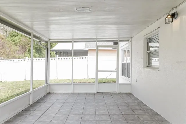 a view of an empty room and window