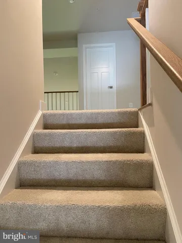 a bathroom with a bathtub and window