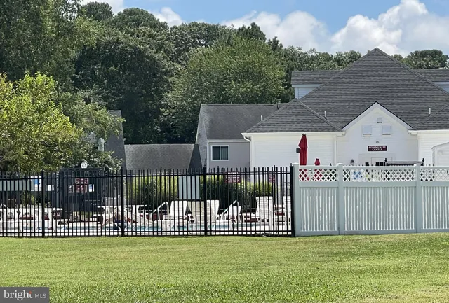 a view of a lake with boats and trees