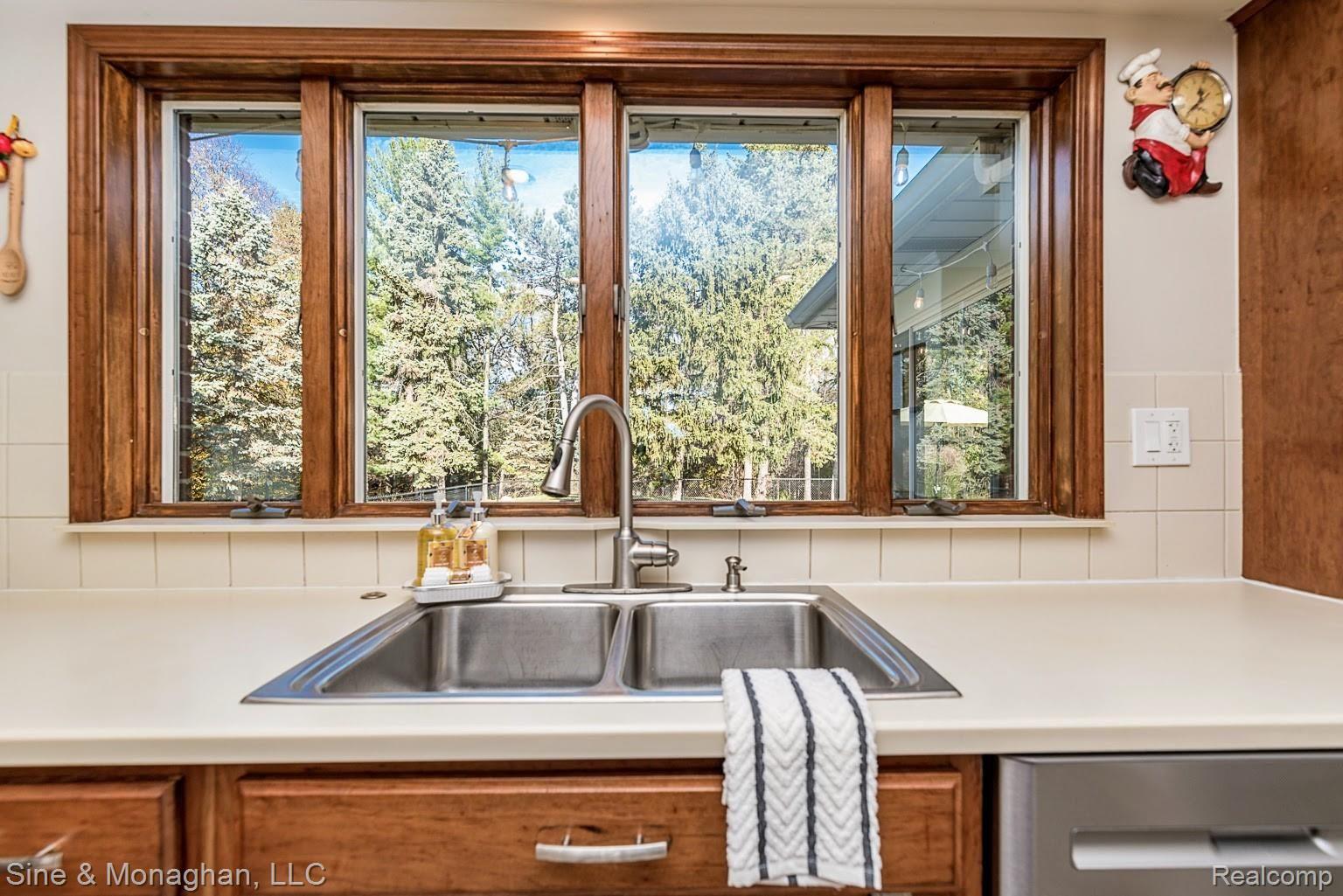 2659 Chicago Road Warren, MI 48092 - Photo 13 of 47 Kitchen over-looking tree lined backyard