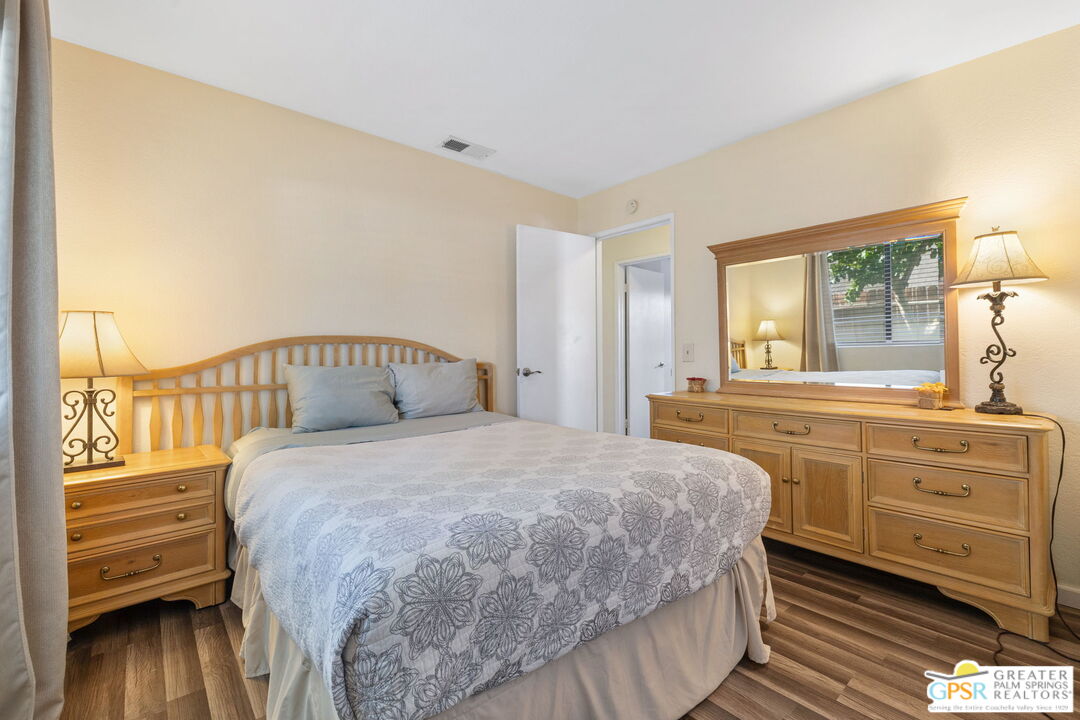 45688 Sutter Creek Road Indio, CA 92201 - Photo 28 of 51 a bedroom with a bed and a window