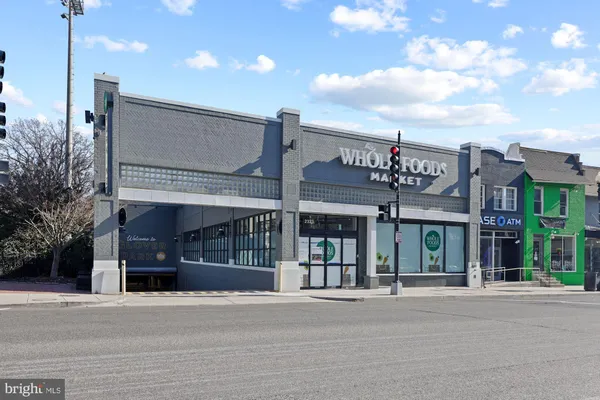 a view of a building with a street