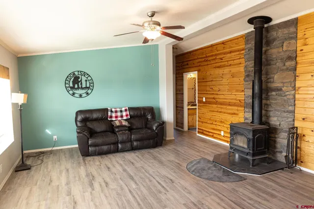 a living room with furniture and a table