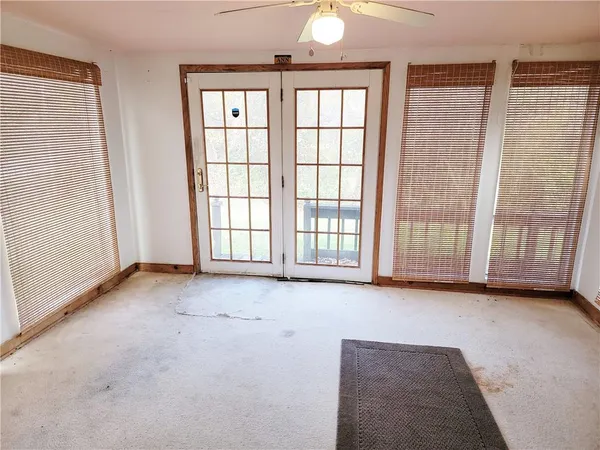 an empty room with windows