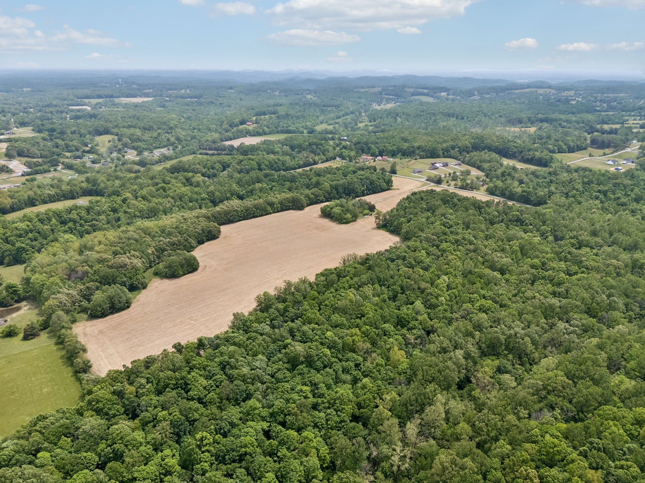 473 Hickory Corner Road Bethpage, TN 37022 - Photo 13 of 45 an aerial view of residential houses with outdoor space and trees