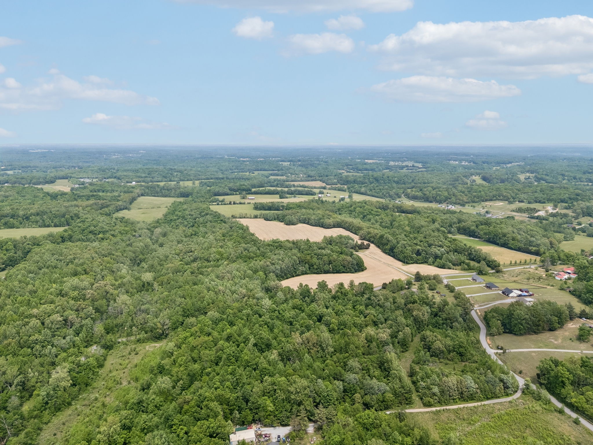 473 Hickory Corner Road Bethpage, TN 37022 - Photo 23 of 45 a view of a lake with a city
