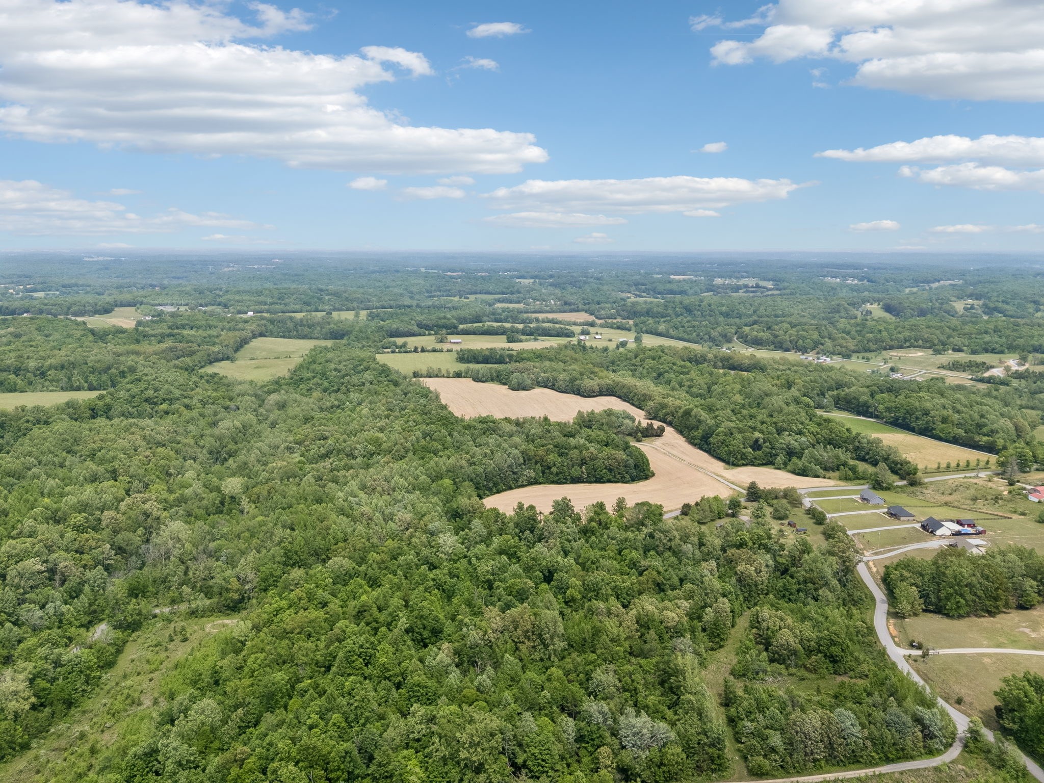 473 Hickory Corner Road Bethpage, TN 37022 - Photo 31 of 45 a view of a lake with a city
