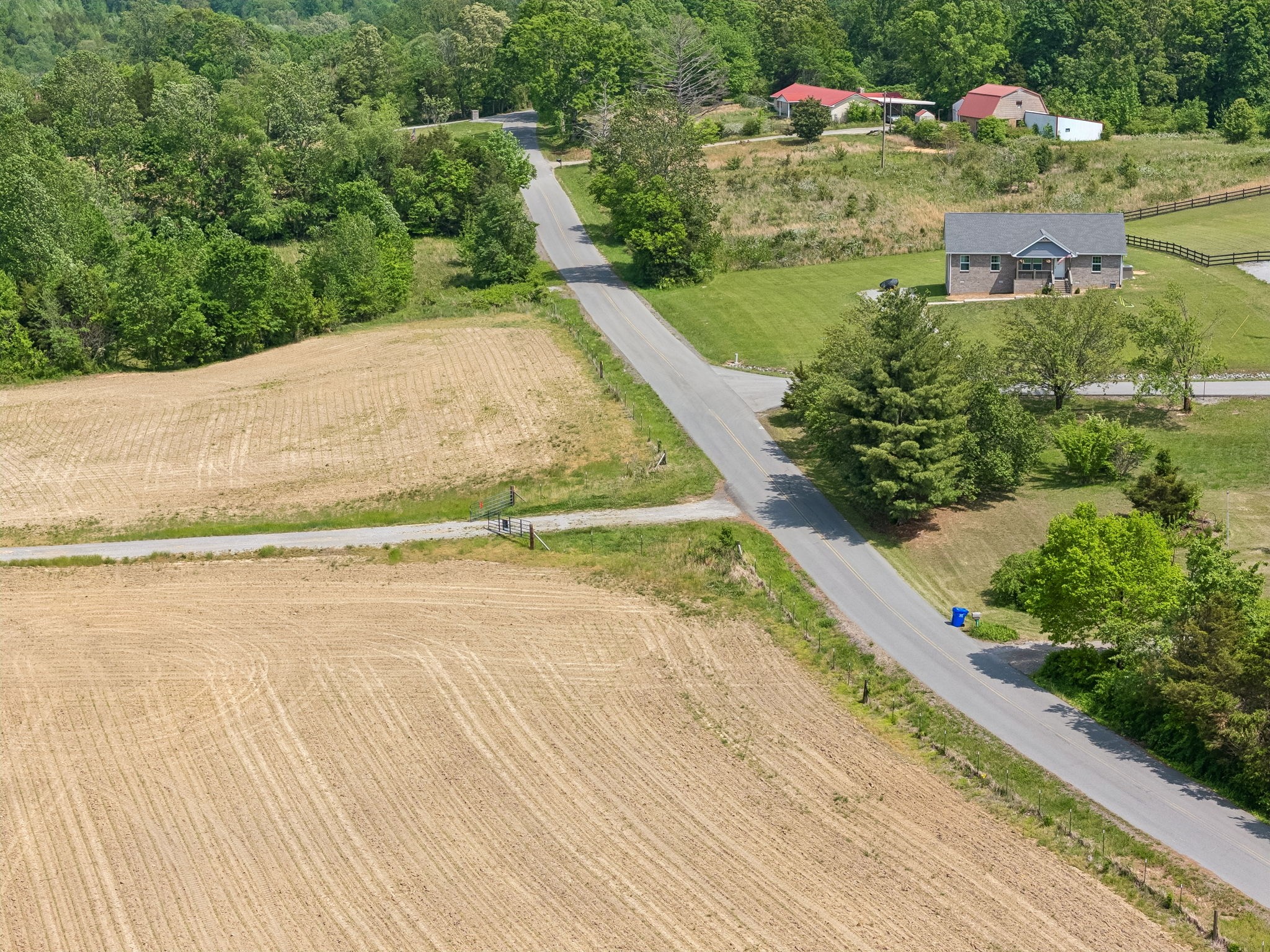 473 Hickory Corner Road Bethpage, TN 37022 - Photo 6 of 45 a view of a house with a yard and a wooden bridge