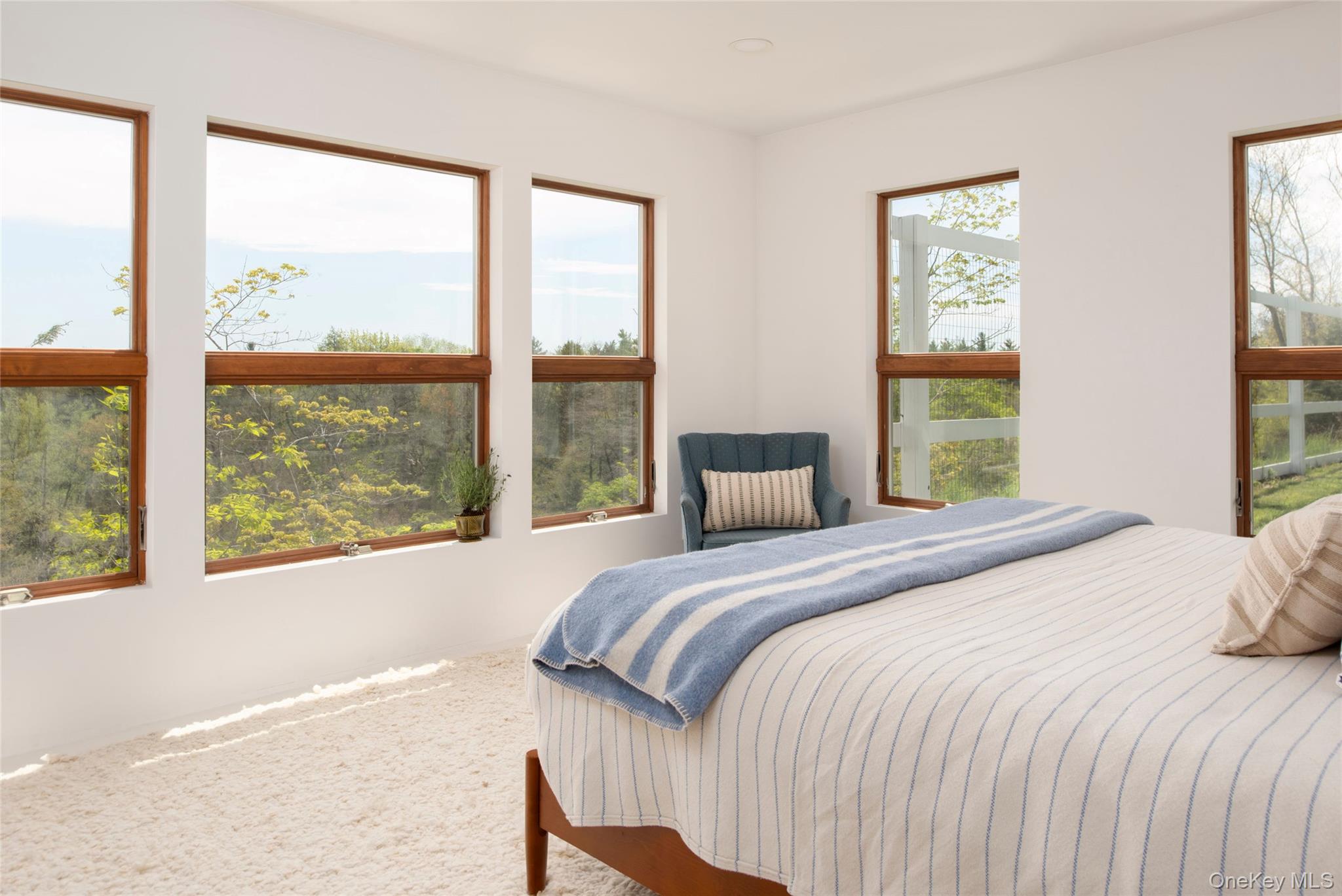 45 Charles Hommel Road Saugerties, NY 12477 - Photo 21 of 39 a bedroom with a large window and a bed