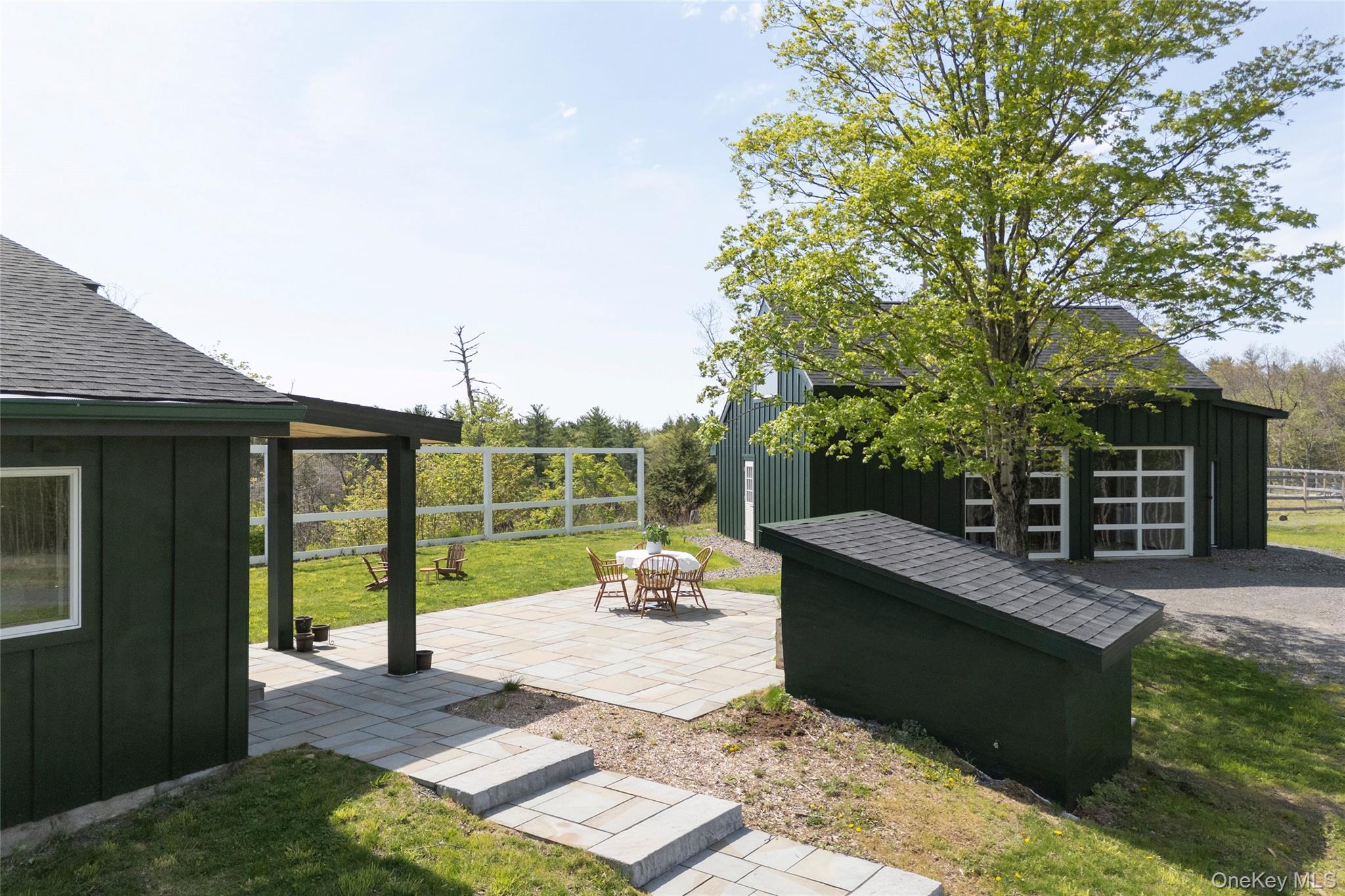 45 Charles Hommel Road Saugerties, NY 12477 - Photo 29 of 39 a backyard of a house with yard table and chairs