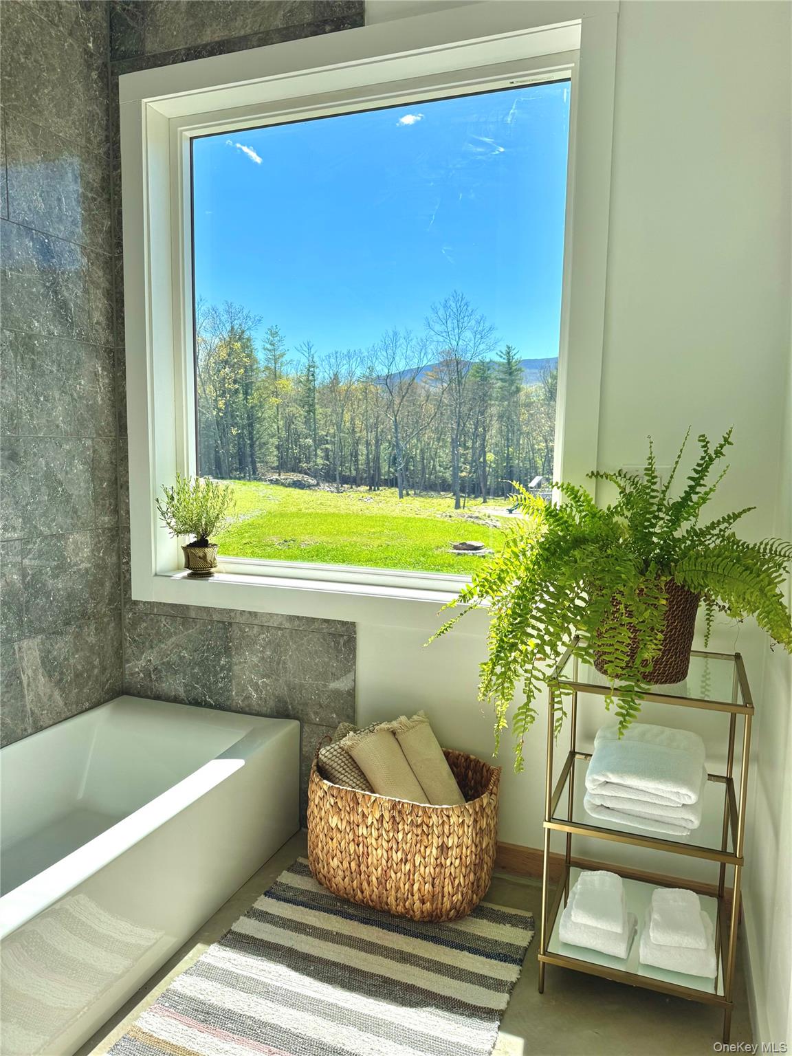 45 Charles Hommel Road Saugerties, NY 12477 - Photo 32 of 39 a bathroom with a bathtub and a shower