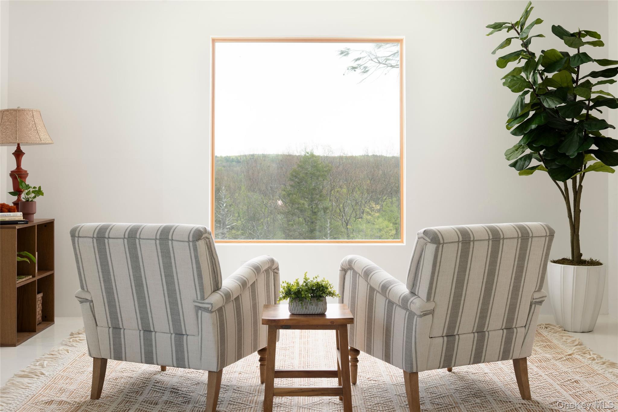45 Charles Hommel Road Saugerties, NY 12477 - Photo 9 of 39 a view of a living room with furniture and a potted plant