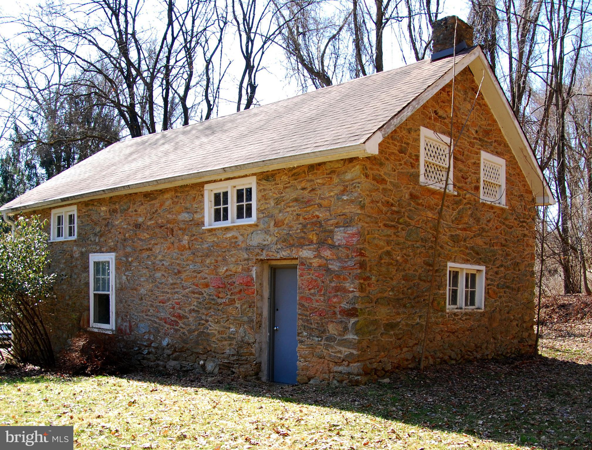 490 Willow Road Nottingham, PA 19362 - Photo 11 of 50 Side view of garage, party room, storage galore