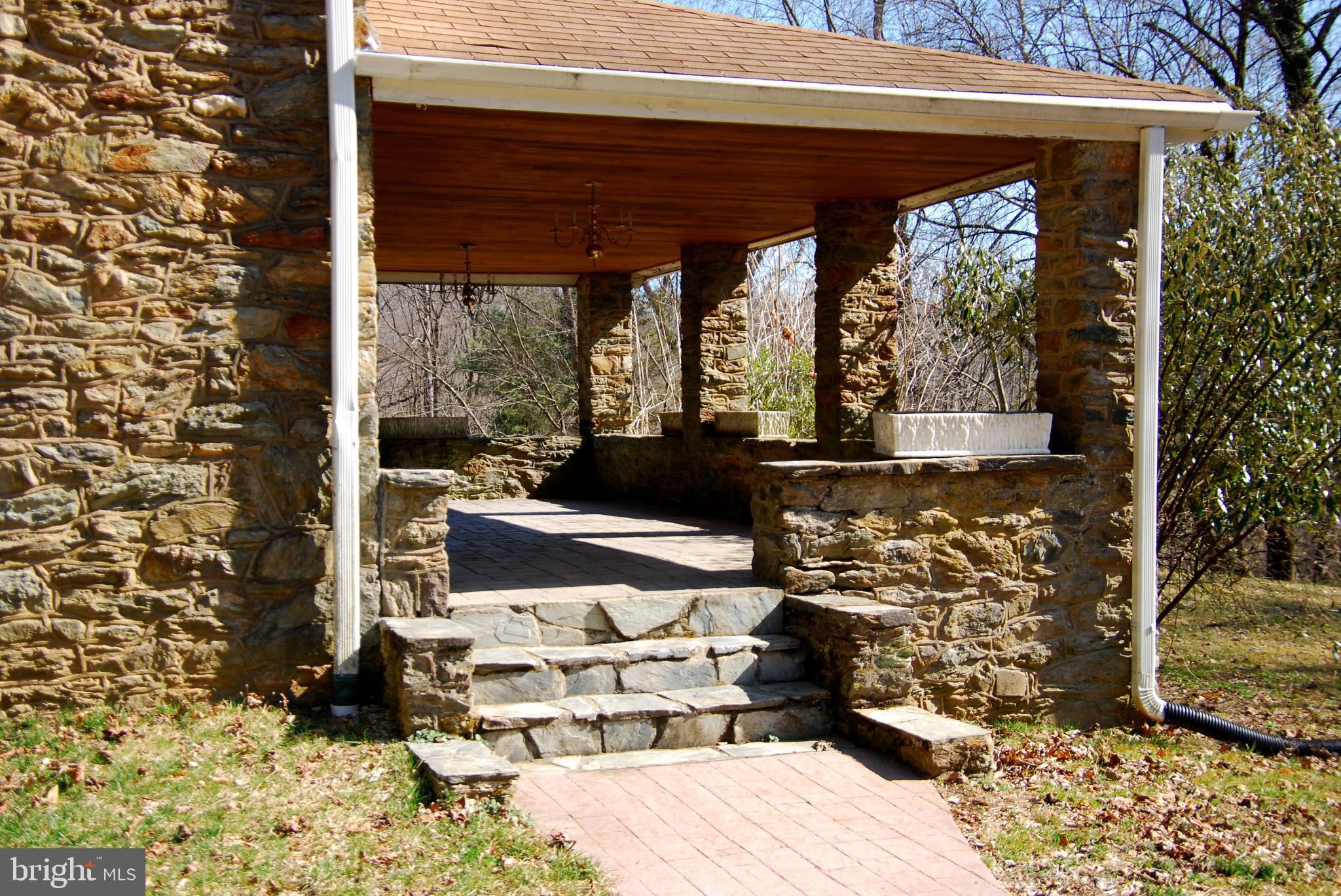 490 Willow Road Nottingham, PA 19362 - Photo 4 of 50 Open stone porch, pine ceiling