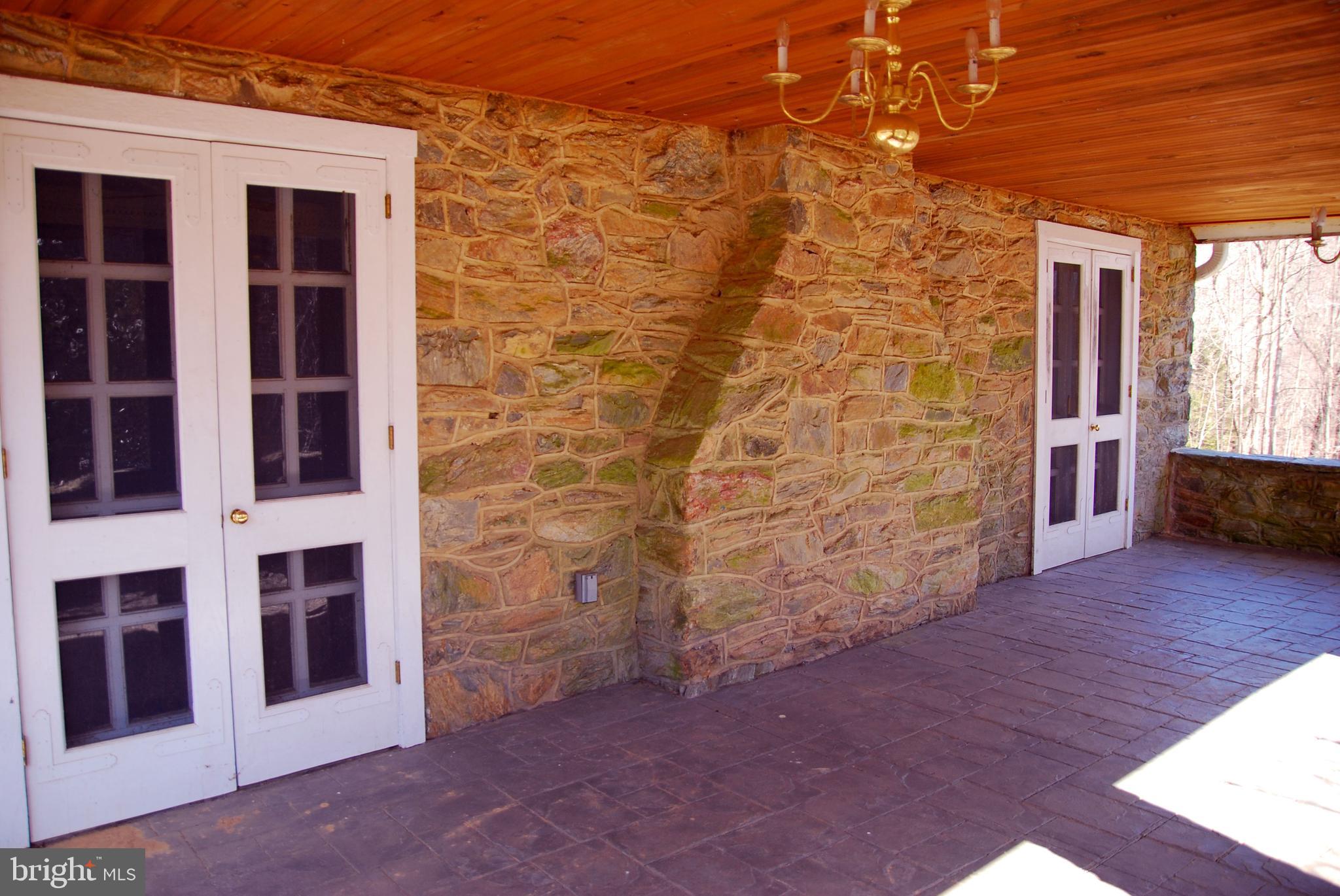 490 Willow Road Nottingham, PA 19362 - Photo 6 of 50 double french doors lead from porch to family room