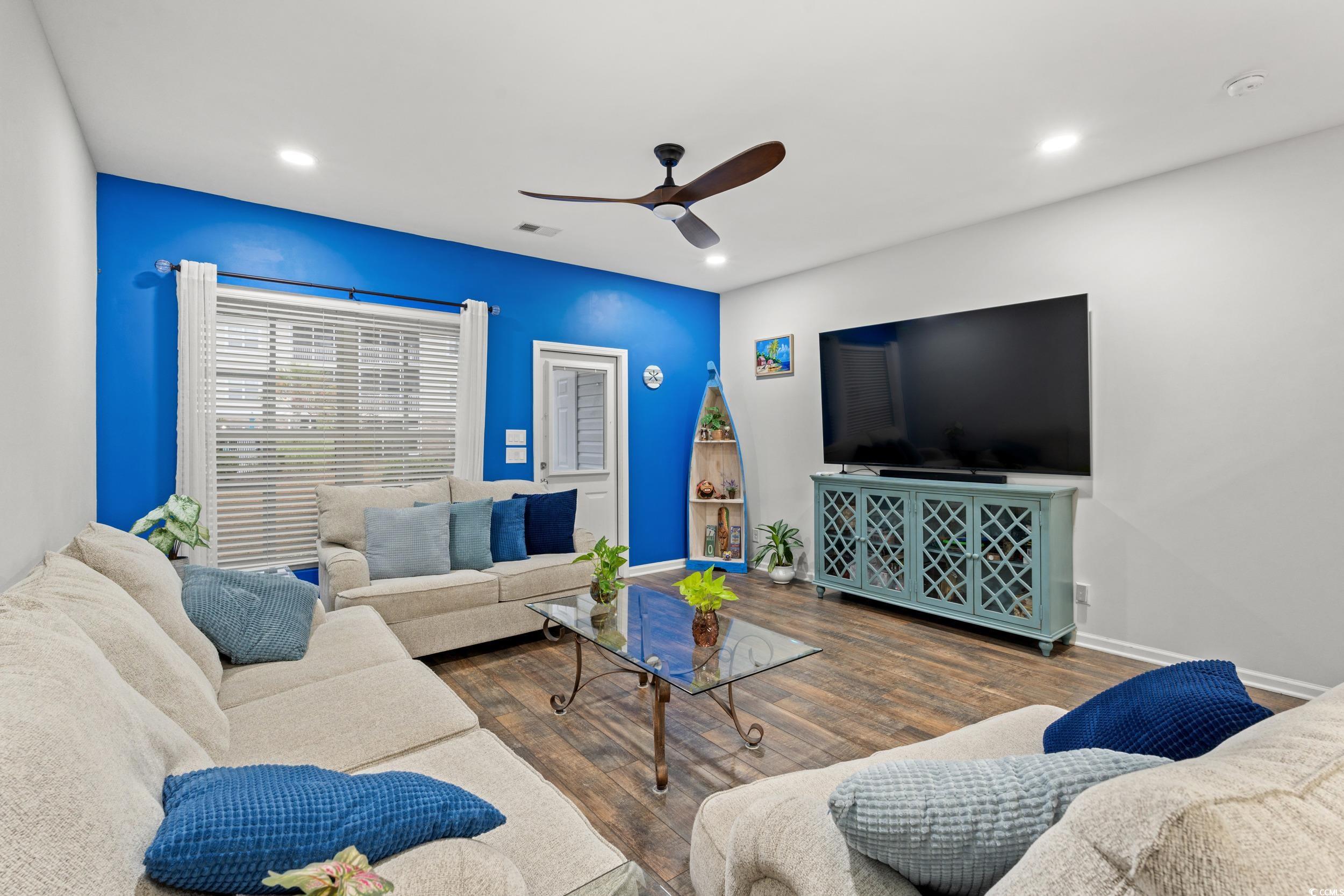 306 Castle Drive, Unit 306 Myrtle Beach, SC 29579 - Photo 5 of 30 Living room featuring wood finished floors, a ceiling fan, and recessed lighting