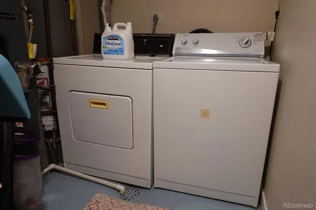 a utility room with dryer and washer