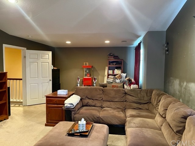 29839 Winter Hawk Road Menifee, CA 92586 - Photo 14 of 21 a living room with furniture and a window
