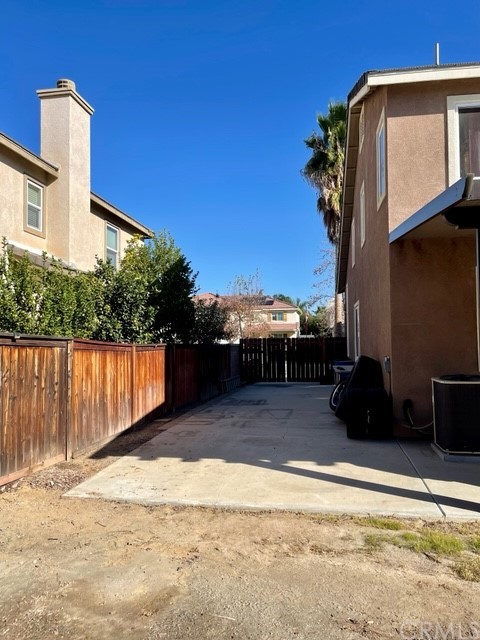 29839 Winter Hawk Road Menifee, CA 92586 - Photo 9 of 21 a view of a house with a yard