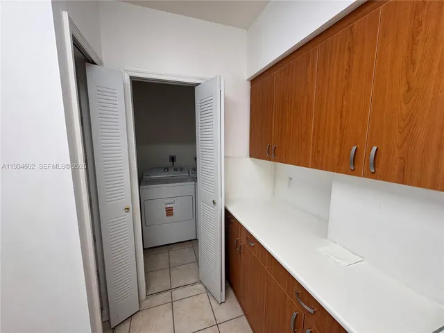 a bathroom with a bathtub and a sink
