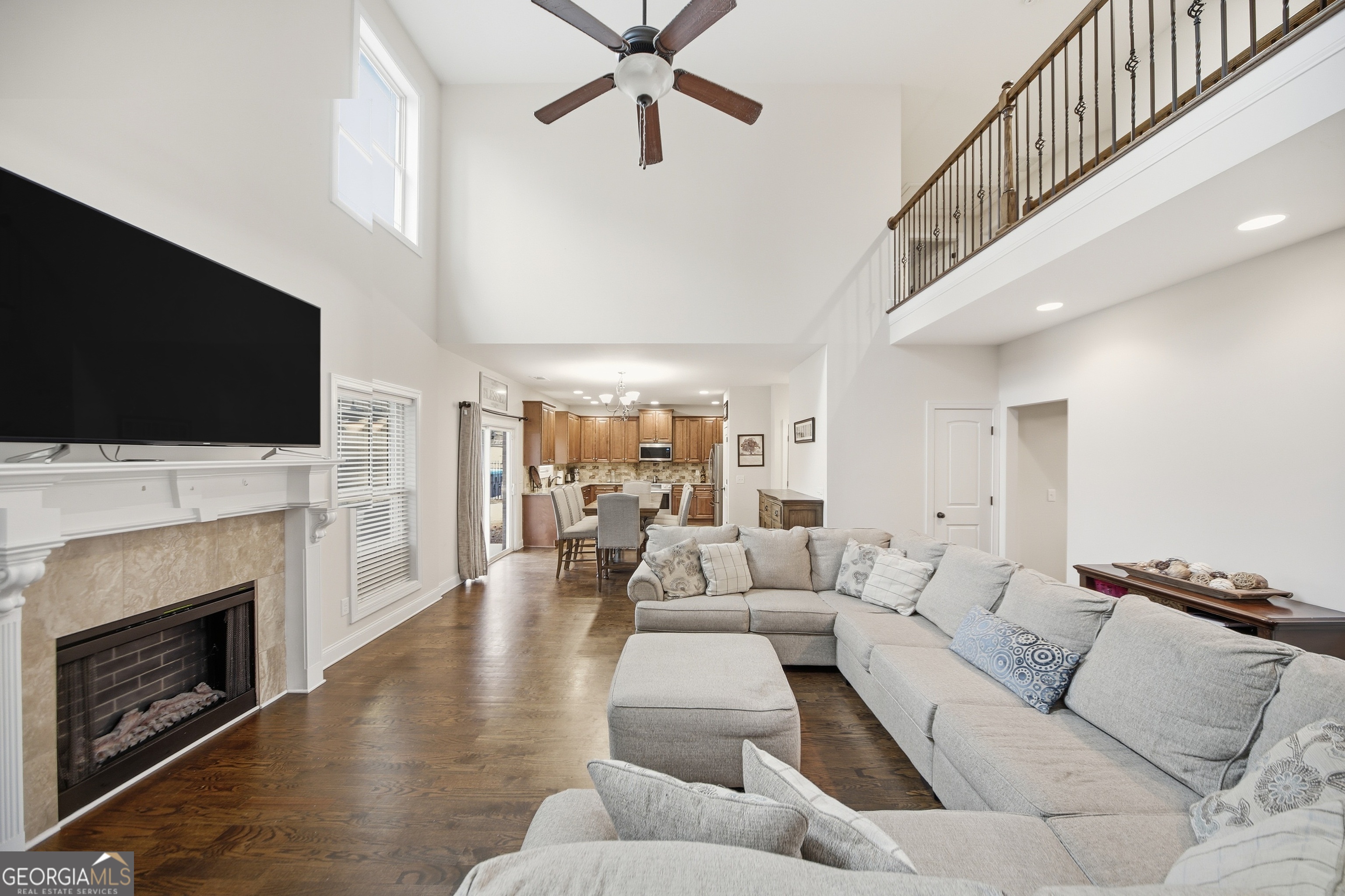 175 Rodgers Road McDonough, GA 30252 - Photo 18 of 84 a living room with furniture fireplace and flat screen tv