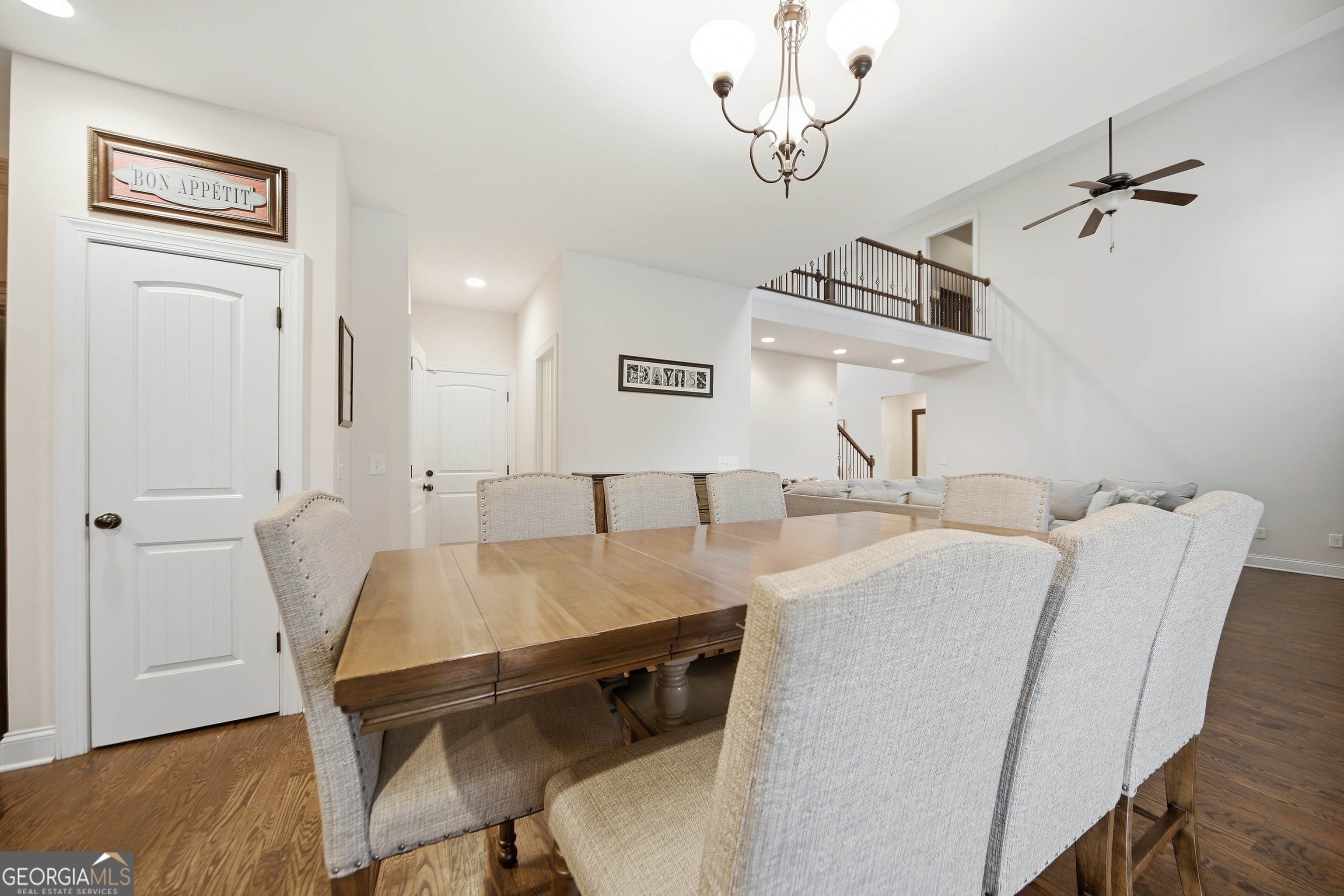 175 Rodgers Road McDonough, GA 30252 - Photo 23 of 84 a view of a dining room with furniture and wooden floor