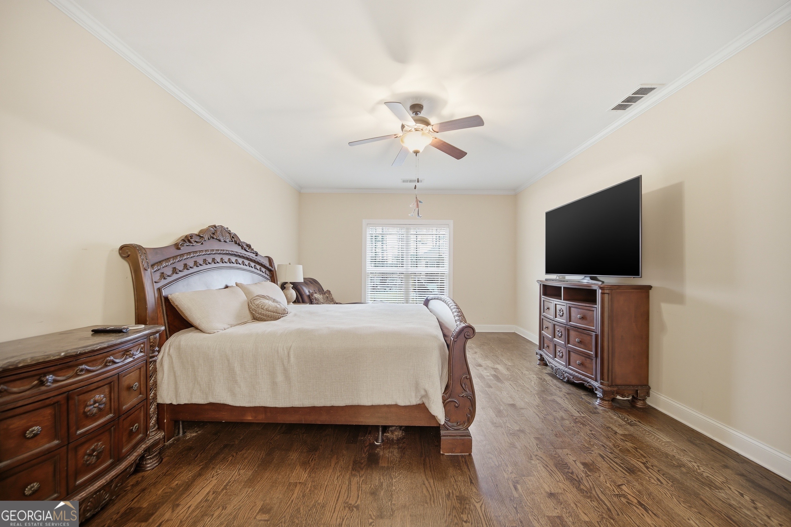 175 Rodgers Road McDonough, GA 30252 - Photo 33 of 84 a bedroom with a bed and a flat screen tv