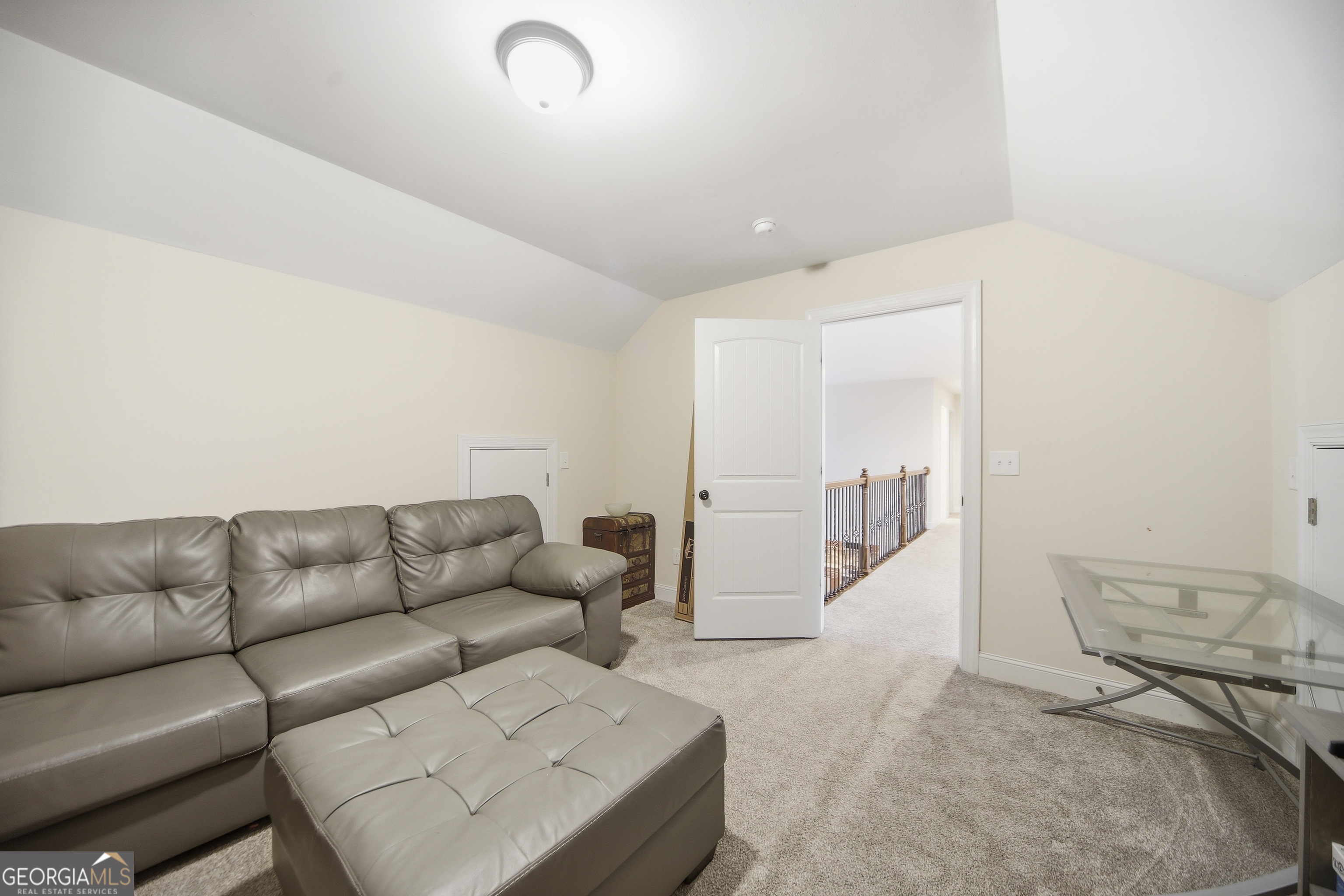175 Rodgers Road McDonough, GA 30252 - Photo 58 of 84 a living room with furniture and a couch