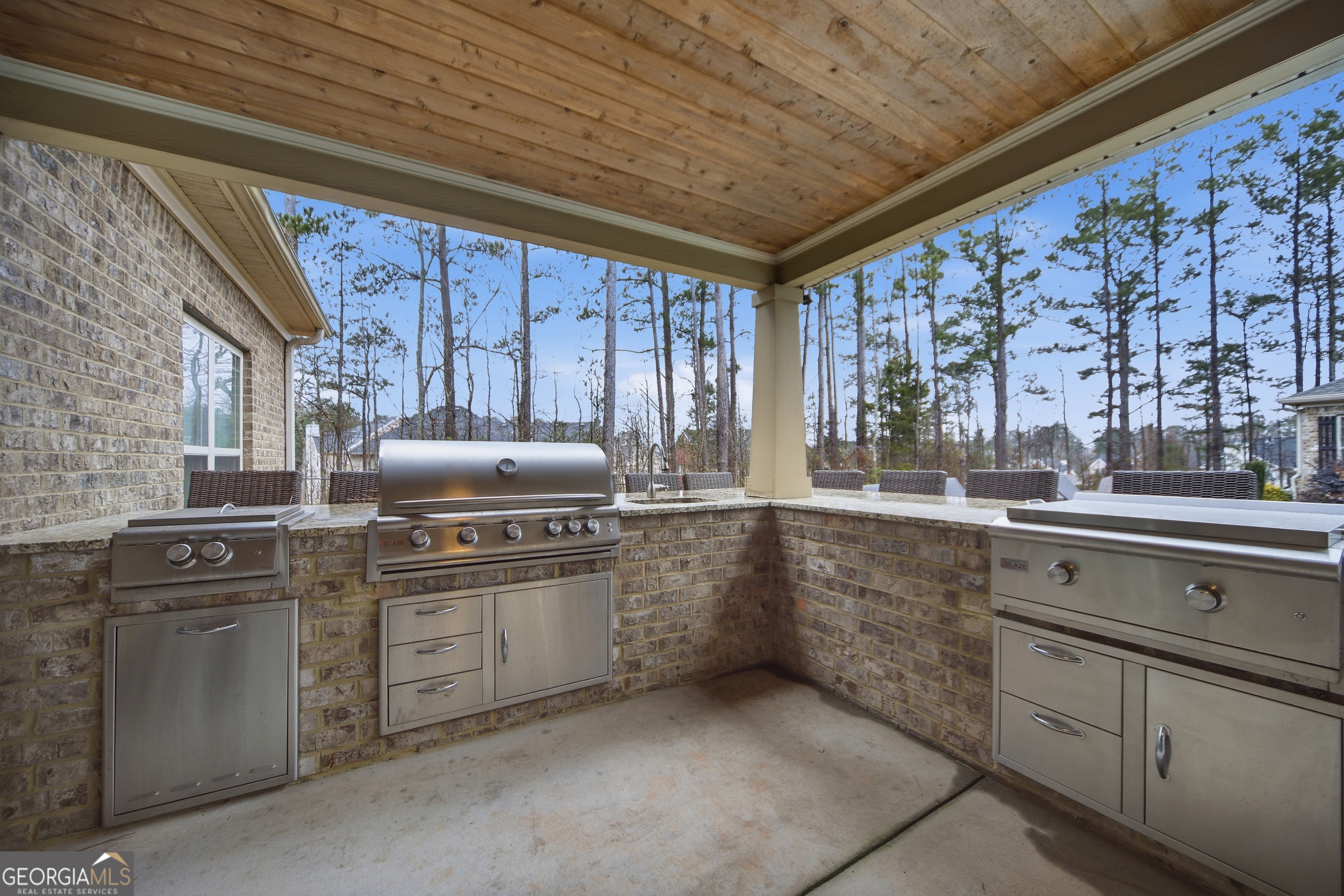 175 Rodgers Road McDonough, GA 30252 - Photo 68 of 84 a kitchen with stainless steel appliances granite countertop a sink a stove and cabinets