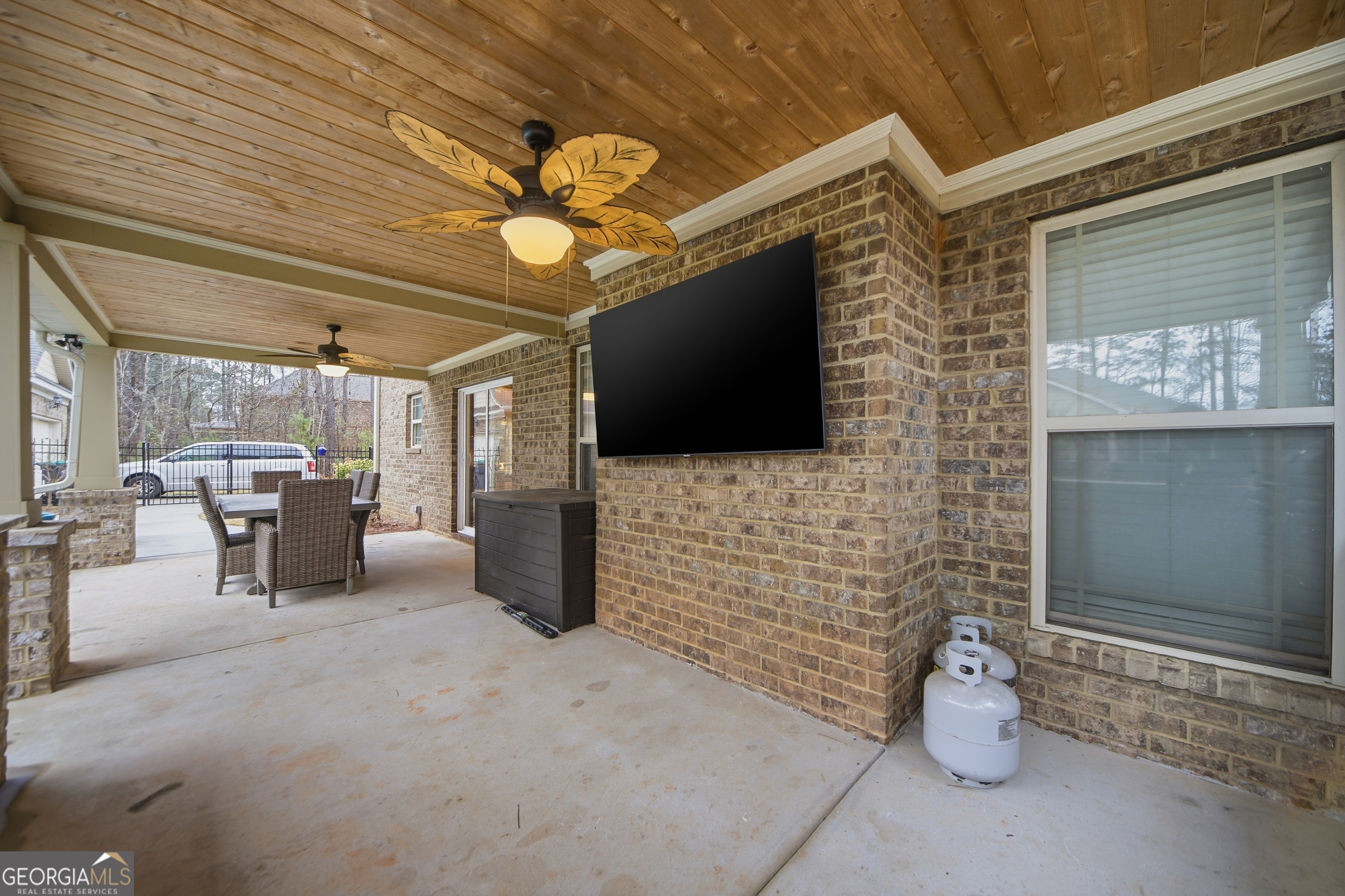 175 Rodgers Road McDonough, GA 30252 - Photo 70 of 84 a view of a livingroom with furniture and a fireplace