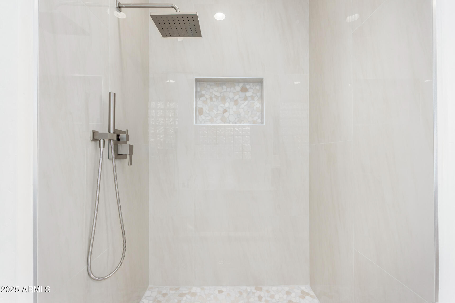 2668 South Stuart Avenue Gilbert, AZ 85295 - Photo 21 of 40 a bathroom with a glass shower door