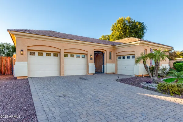 a front view of a house with a garage