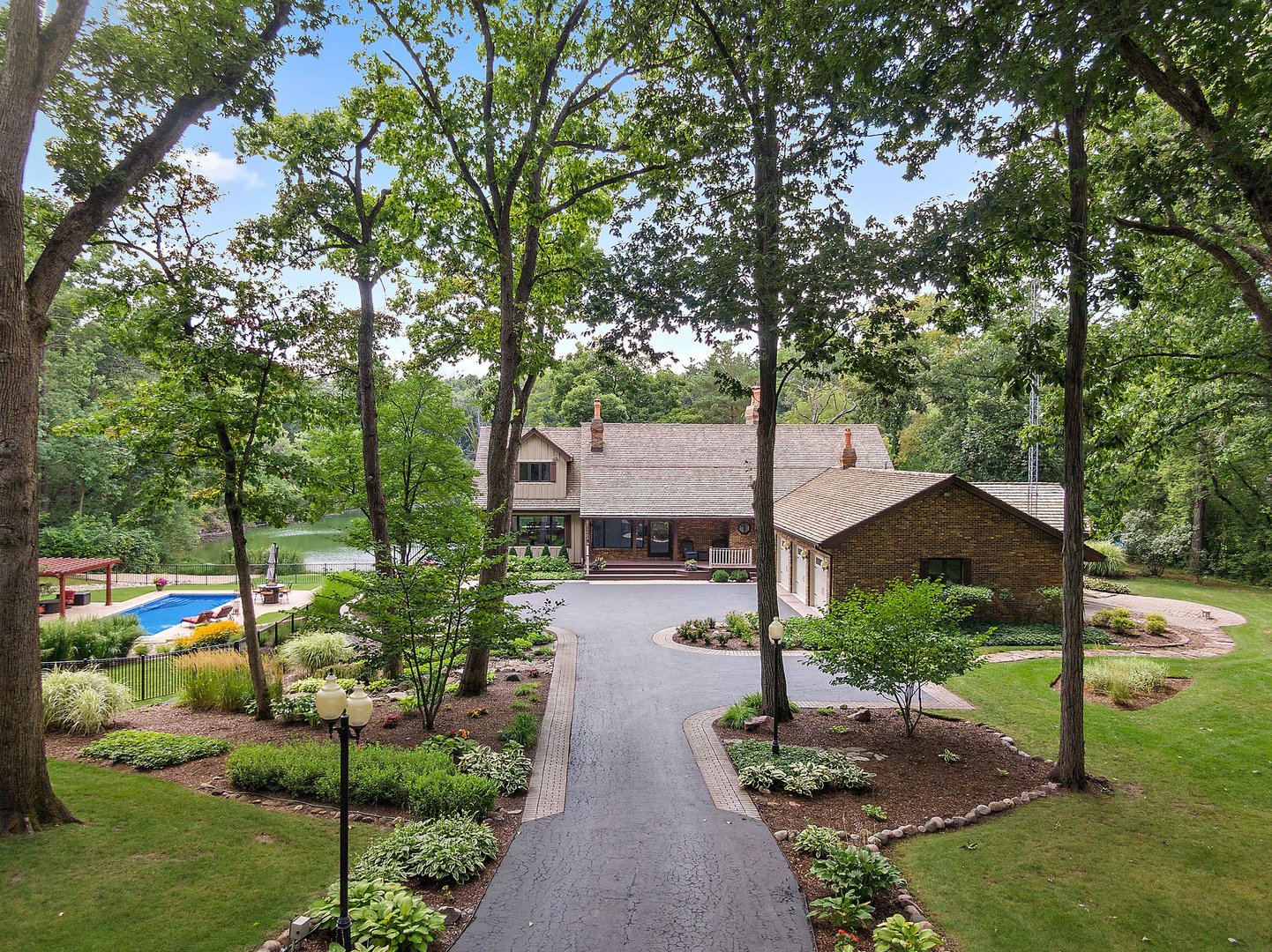 Undisclosed Address Woodstock, IL 60098 - Photo 1 of 40 a view of house and garden