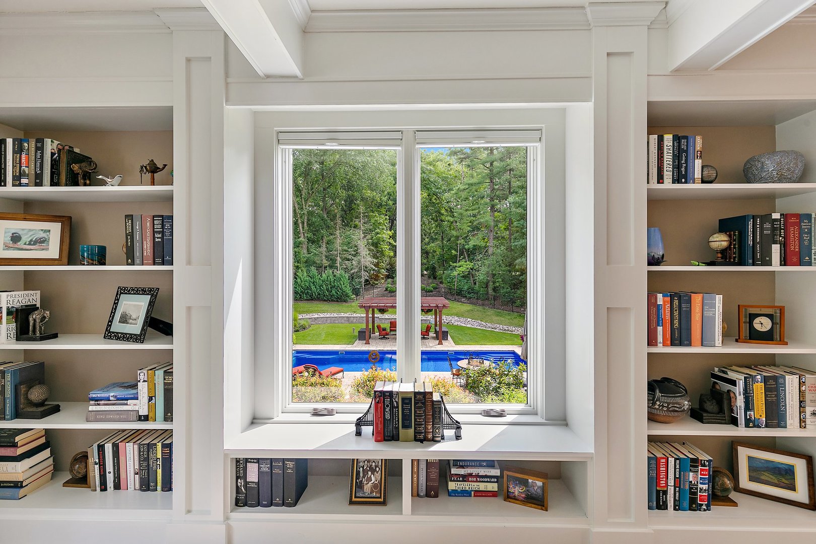 Undisclosed Address Woodstock, IL 60098 - Photo 22 of 40 a room with lots of books and a window