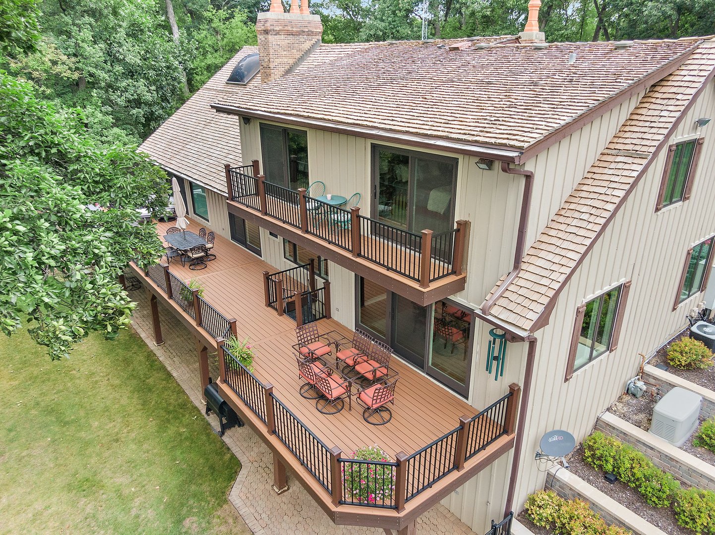 Undisclosed Address Woodstock, IL 60098 - Photo 34 of 40 an aerial view of a house with balcony and deck