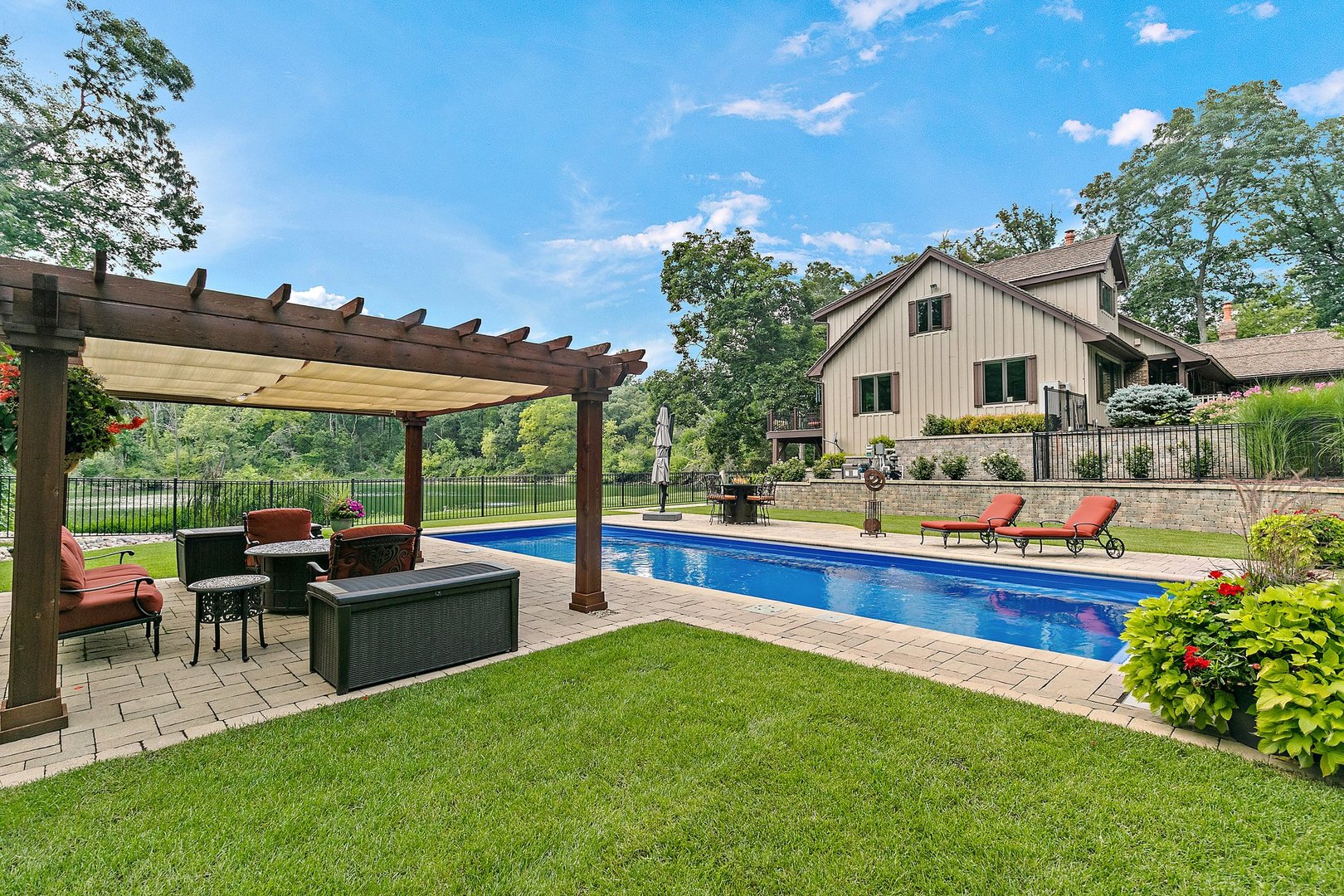 Undisclosed Address Woodstock, IL 60098 - Photo 6 of 40 a view of an house with porch and garden