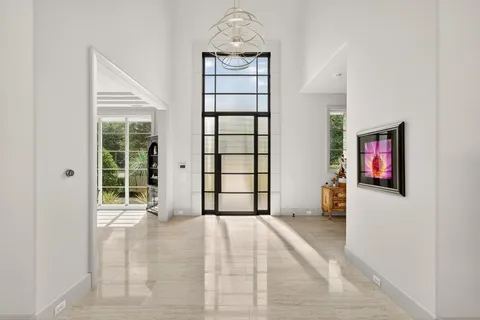 a view of workspace with window and ceiling fan