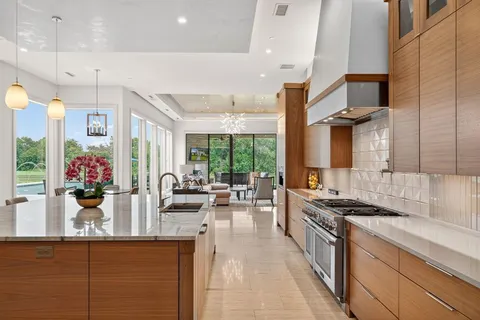 a kitchen with counter top space and stainless steel appliances