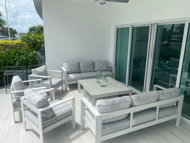 a view of table and chairs in balcony