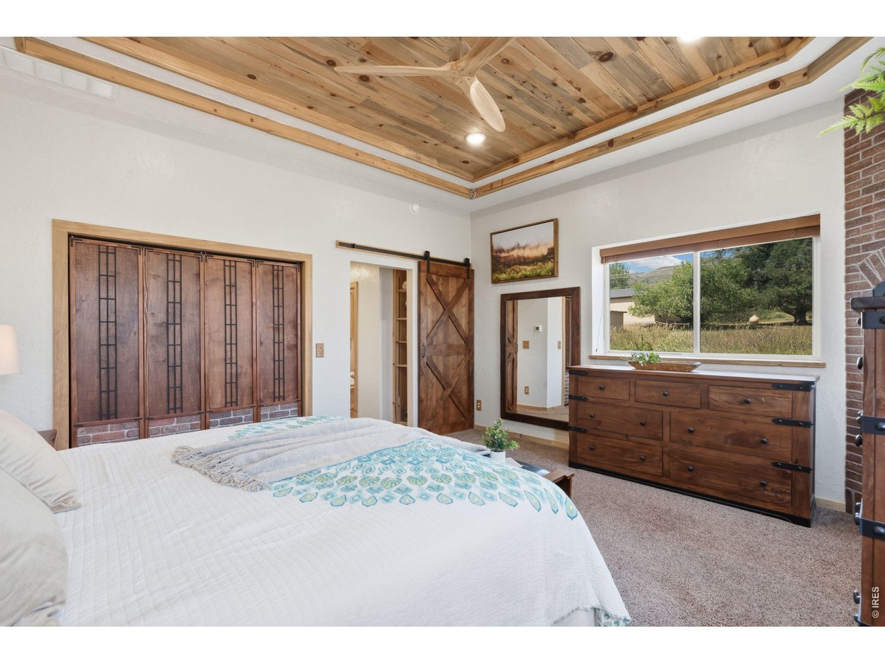 54 Rist View Road Bellvue, CO 80512 - Photo 15 of 50 Primary Bedroom pine beetle kill ceiling