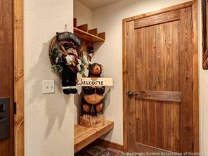 655 4 O Clock Road, Unit 109 Breckenridge, CO 80424 - Photo 11 of 17 a view of entryway with wooden door