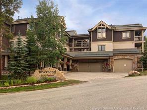 655 4 O Clock Road, Unit 109 Breckenridge, CO 80424 - Photo 13 of 17 a front view of a house with a yard