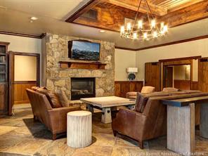 655 4 O Clock Road, Unit 109 Breckenridge, CO 80424 - Photo 16 of 17 a living room with furniture and a fireplace