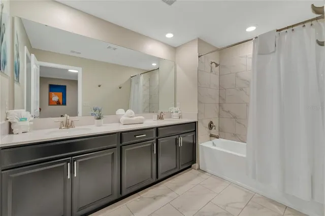 a view of a backyard with plants and a patio