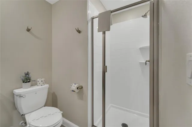 a patio with a table and chairs